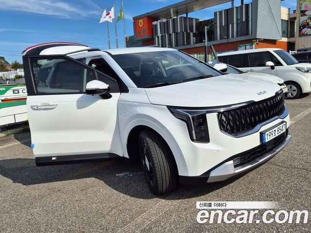 Kia Carnival HEV 9 seater Prestige — пробег 890 км — фото 2 из 5