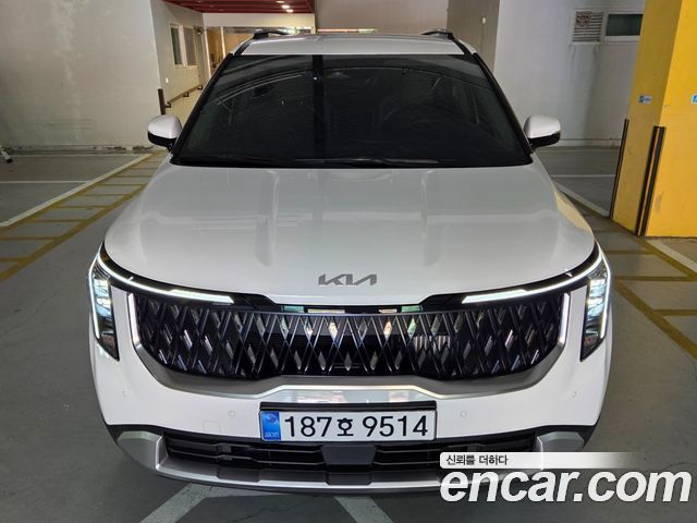 Kia Carnival HEV 9 seater Prestige — пробег 1 100 км — фото 1 из 5