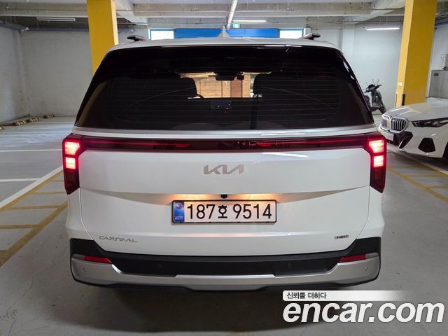 Kia Carnival HEV 9 seater Prestige — пробег 1 100 км — фото 4 из 5