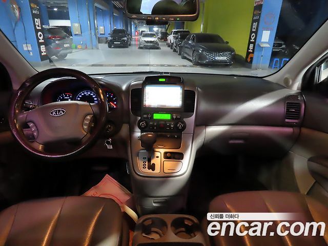 Kia Carnival Grand Carnival GLX Deluxe — пробег 202 391 км — фото 5 из 5