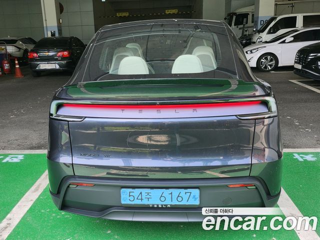 Tesla Model Y L Long Range AWD — пробег 883 км — фото 2 из 5