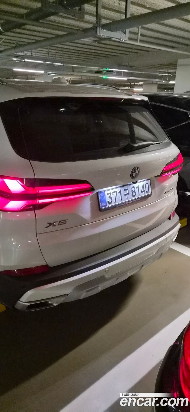 BMW X5 xDrive 50e xLine — пробег 7 062 км — фото 4 из 5