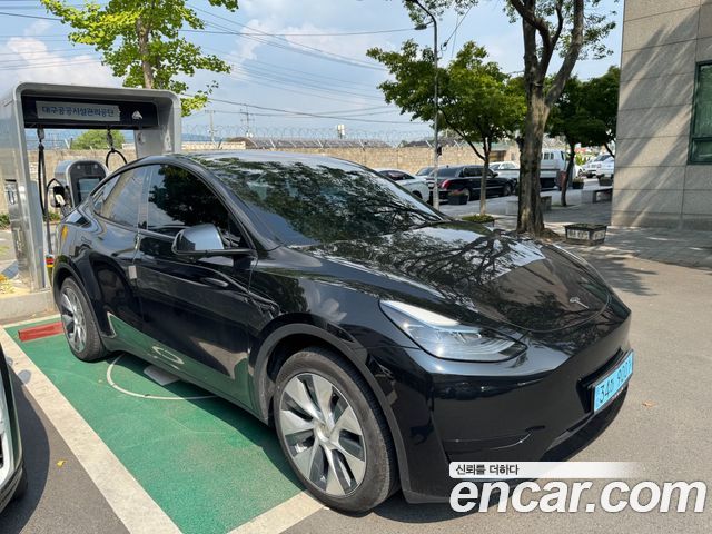 Tesla Model Y RWD — пробег 27 983 км — фото 2 из 5