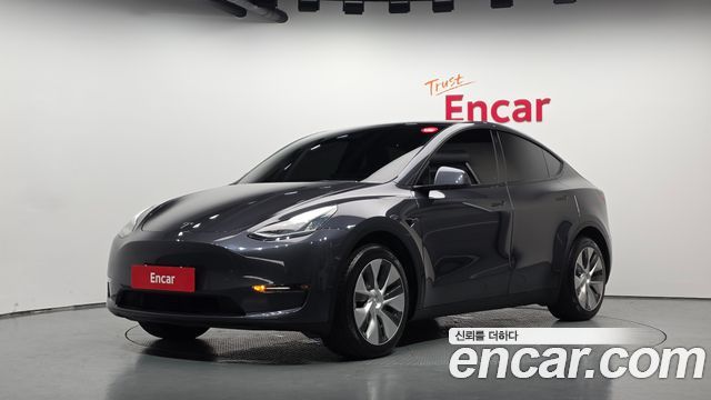 Tesla Model Y Standard Range RWD — пробег 96 971 км — фото 1 из 5