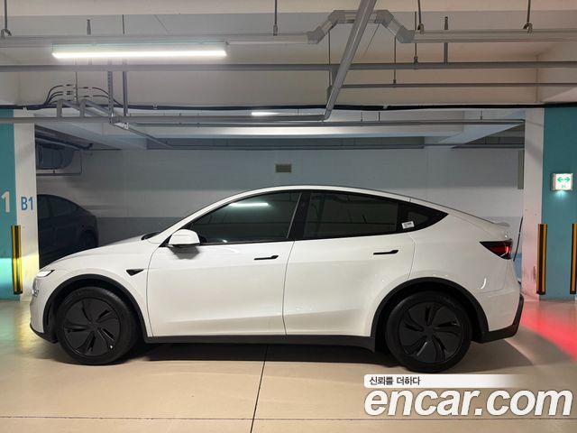 Tesla Model Y Premium RWD — пробег 13 657 км — фото 2 из 5