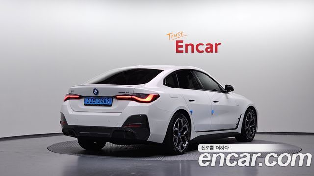 BMW i4 eDrive40 M Sports Pro — пробег 62 486 км — фото 2 из 5