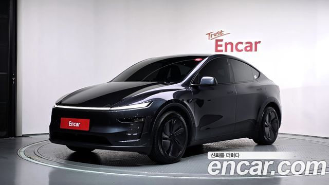 Tesla Model Y RWD — пробег 33 345 км — фото 1 из 5