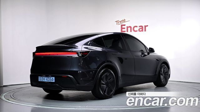 Tesla Model Y RWD — пробег 33 345 км — фото 2 из 5