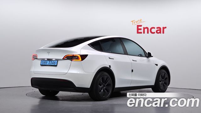Tesla Model Y RWD — пробег 48 128 км — фото 2 из 5