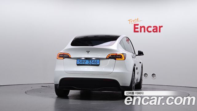 Tesla Model Y RWD — пробег 48 128 км — фото 4 из 5