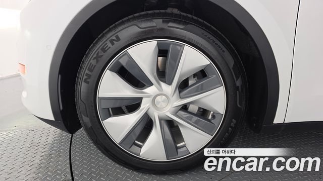 Tesla Model Y Long Range AWD — пробег 91 787 км — фото 5 из 5