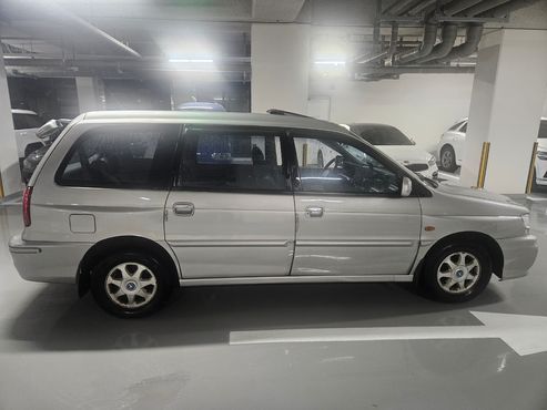 Kia Carstar 7-Seater LPG LX — пробег 204 750 км — фото 4 из 5