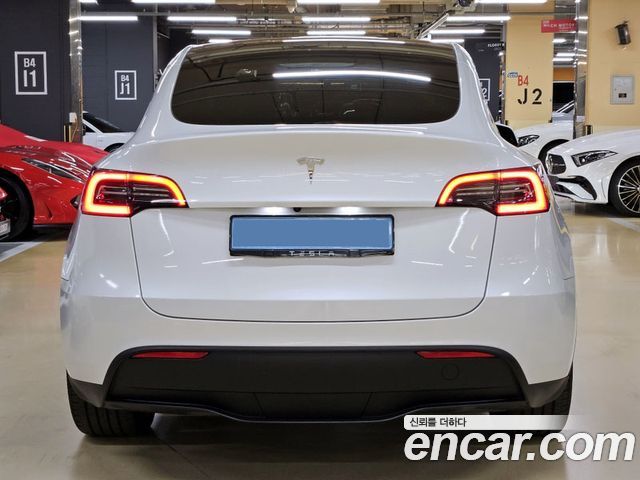 Tesla Model Y RWD — пробег 29 823 км — фото 4 из 5