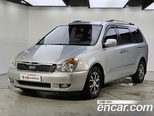 Kia Carnival Grand Carnival GLX Deluxe — пробег 128 670 км — фото 1 из 5