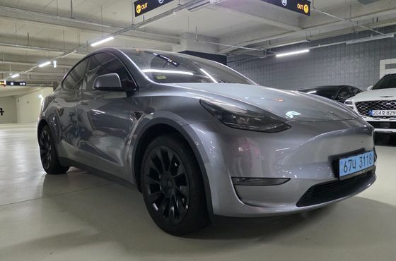 Tesla Model Y Long Range AWD — пробег 56 400 км — фото 1 из 5