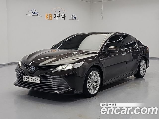 Toyota Camry 2.5 XLE Hybrid — пробег 142 689 км — фото 1 из 5