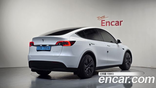 Tesla Model Y Long Range AWD — пробег 35 567 км — фото 2 из 5