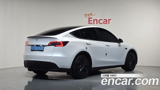 Tesla Model Y RWD — пробег 35 569 км — фото 2 из 5