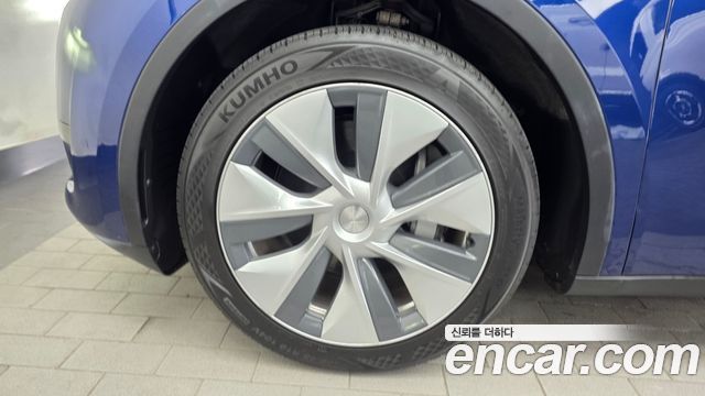 Tesla Model Y RWD — пробег 47 376 км — фото 5 из 5