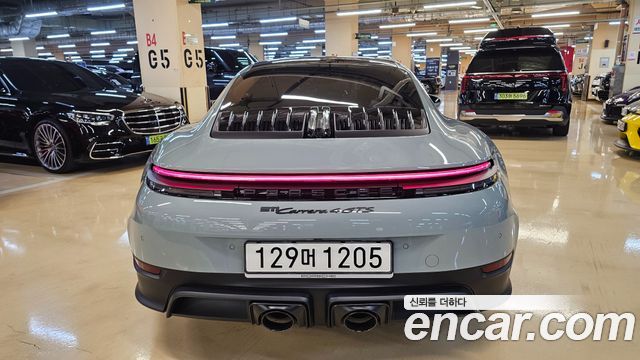 Porsche 911 Carrera 4 GTS — пробег 4 659 км — фото 4 из 5
