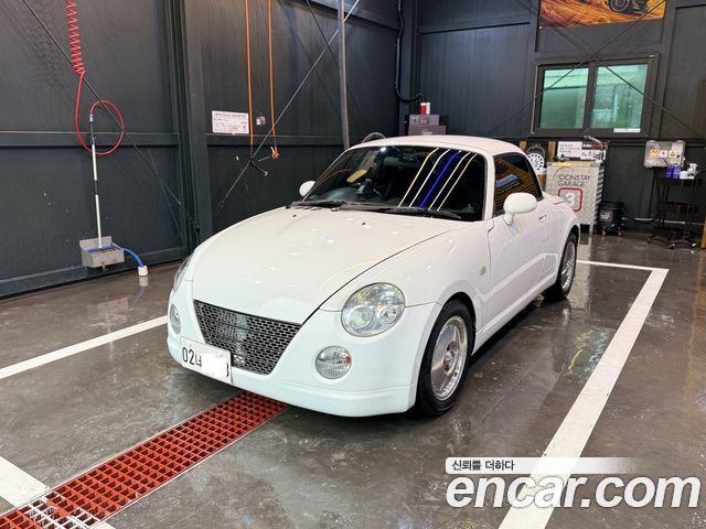 Daihatsu Copen 0.6 — пробег 154 000 км — фото 2 из 5