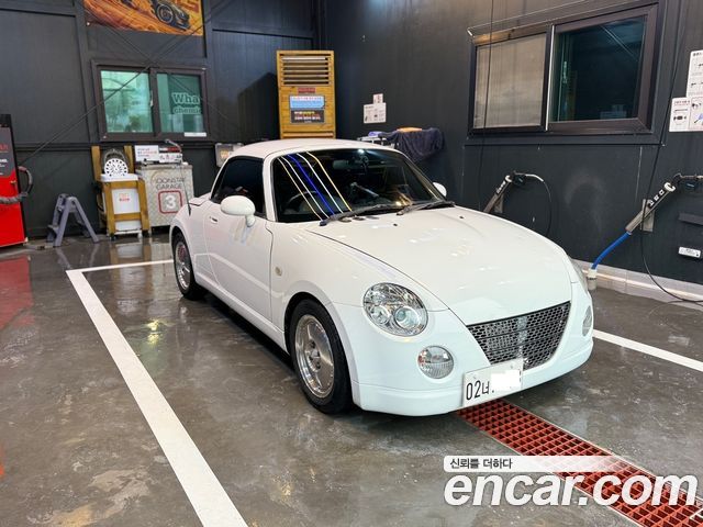 Daihatsu Copen 0.6 — пробег 154 000 км — фото 3 из 5