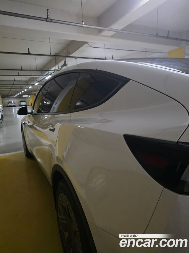 Tesla Model Y L Long Range AWD — пробег 907 км — фото 2 из 5