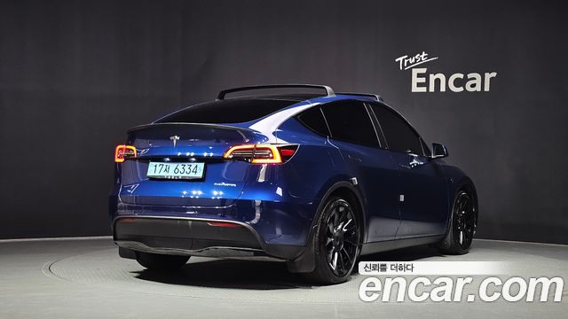 Tesla Model Y Long Range AWD — пробег 94 996 км — фото 2 из 5