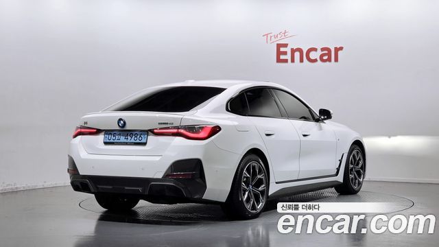 BMW i4 eDrive40 M Sports Pro — пробег 76 809 км — фото 2 из 5