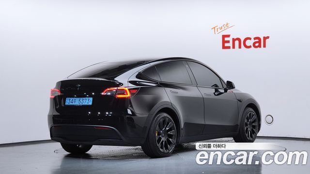 Tesla Model Y RWD — пробег 63 692 км — фото 2 из 5