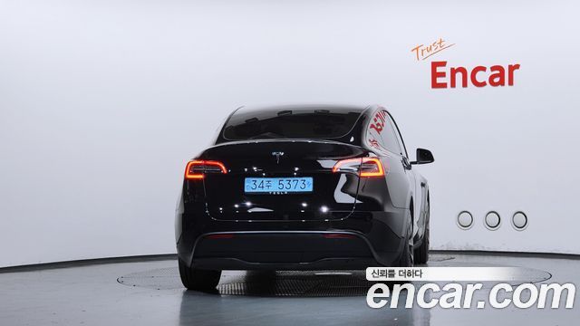Tesla Model Y RWD — пробег 63 692 км — фото 4 из 5