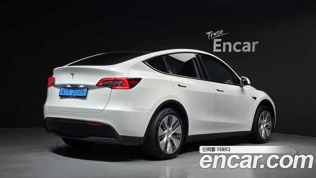 Tesla Model Y RWD — пробег 61 949 км — фото 2 из 5