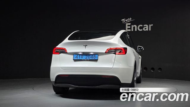 Tesla Model Y RWD — пробег 61 949 км — фото 4 из 5