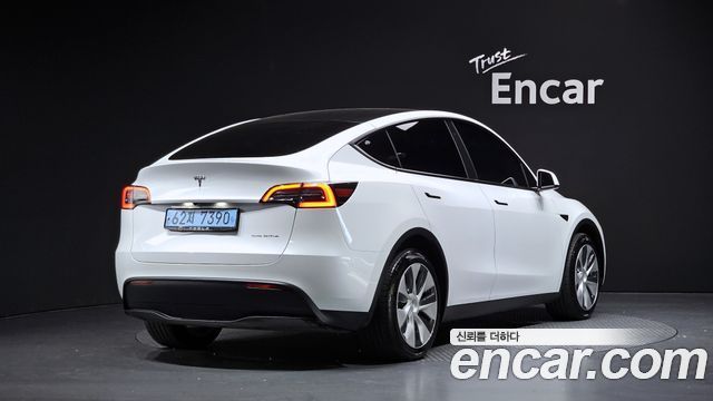 Tesla Model Y Long Range AWD — пробег 50 957 км — фото 2 из 5