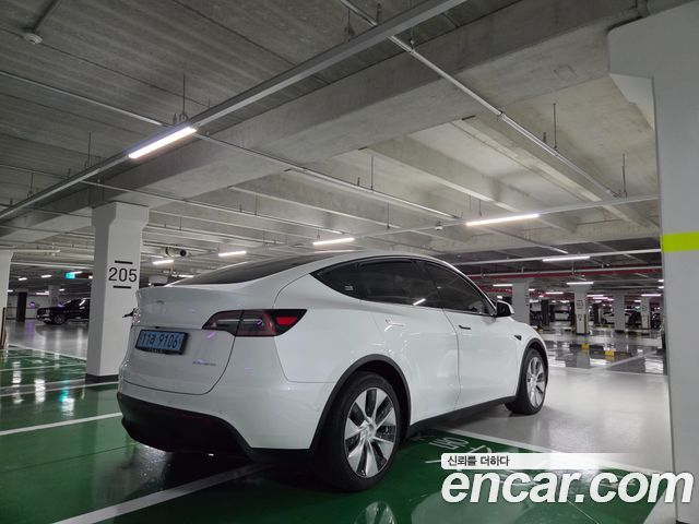 Tesla Model Y Long Range AWD — пробег 59 500 км — фото 2 из 5