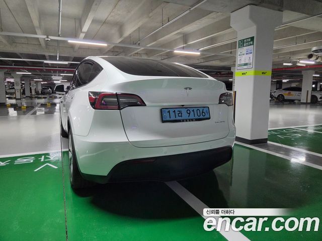Tesla Model Y Long Range AWD — пробег 59 500 км — фото 4 из 5