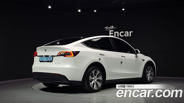 Tesla Model Y Long Range AWD — пробег 57 931 км — фото 2 из 5