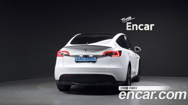 Tesla Model Y RWD — пробег 54 496 км — фото 4 из 5