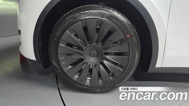 Tesla Model Y RWD — пробег 54 496 км — фото 5 из 5