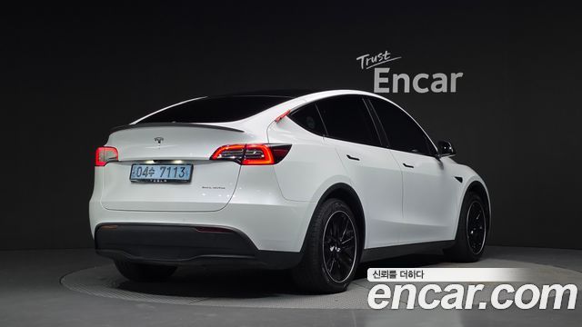 Tesla Model Y Long Range AWD — пробег 57 208 км — фото 2 из 5