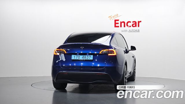 Tesla Model Y RWD — пробег 11 850 км — фото 4 из 5