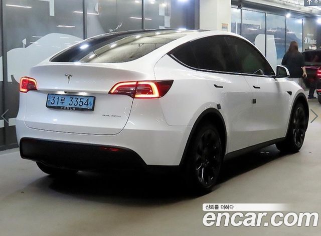 Tesla Model Y Long Range AWD — пробег 99 004 км — фото 3 из 5