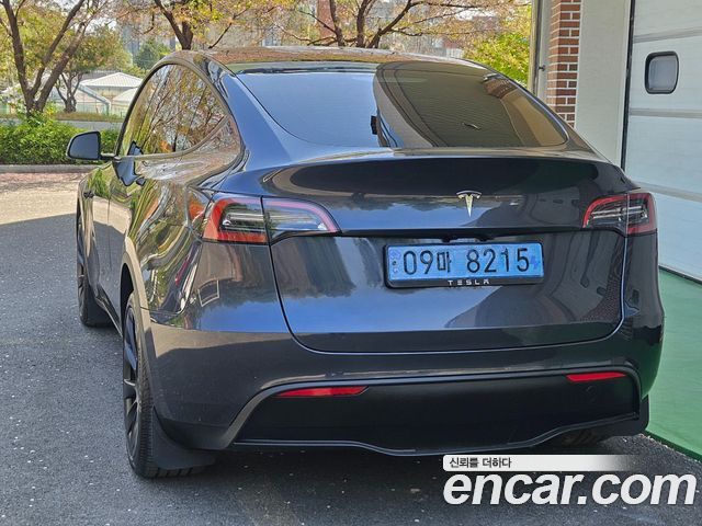Tesla Model Y RWD — пробег 16 402 км — фото 4 из 5