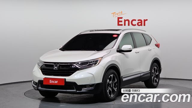 Honda CR-V 1.5 Touring 4WD — пробег 120 475 км — фото 1 из 5