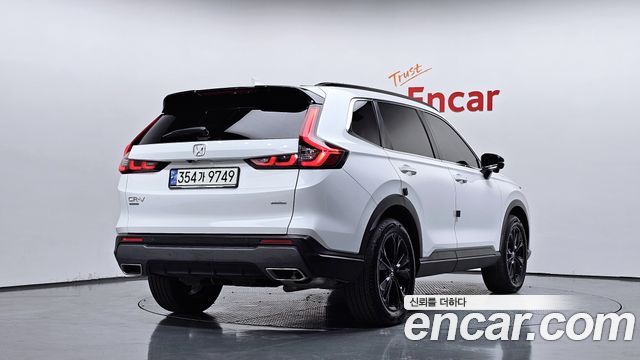 Honda CR-V 2.0 Hybrid Touring 4WD — пробег 94 075 км — фото 2 из 5