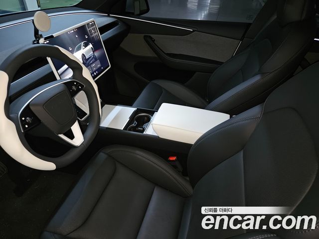 Tesla Model Y Premium RWD — пробег 1 281 км — фото 5 из 5