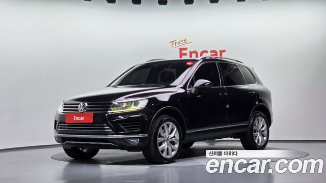 Volkswagen Touareg V6 3.0 TDI Bluemotion Premium 7P5 — пробег 142 933 км — фото 1 из 5