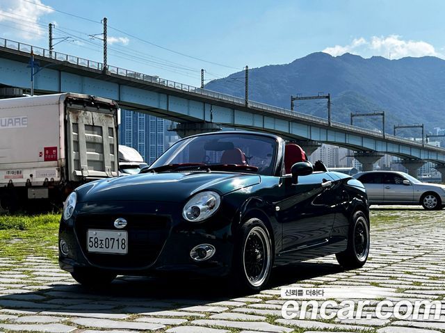 Daihatsu Copen 0.6 — пробег 146 465 км — фото 3 из 5