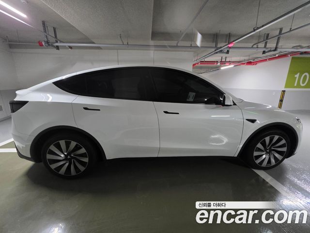 Tesla Model Y Long Range AWD — пробег 31 000 км — фото 5 из 5