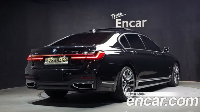 BMW 7-Series 740Li xDrive M Sport Package — пробег 166 312 км — фото 2 из 5